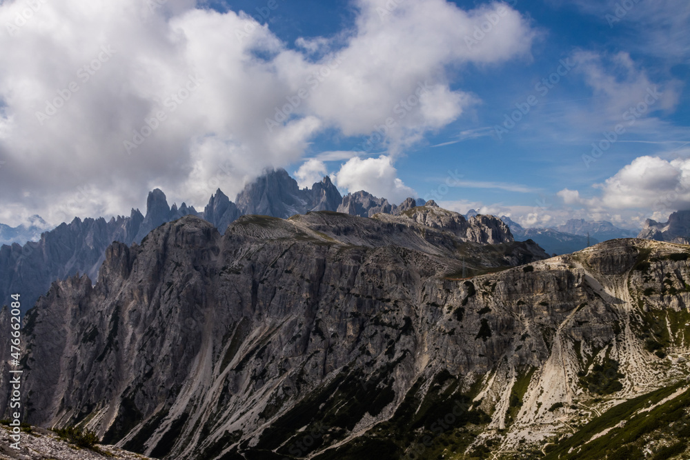 Clouds over mountain trail Tre Cime di Lavaredo in Dolomites in Italy