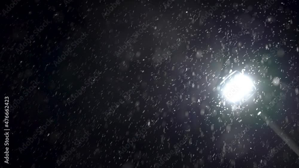 Lamp post with snow particles Lamp post with snow particles