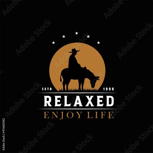 Cowboy Riding a donkey Silhouette at Sunset Relaxation logo design illustration on Moon background