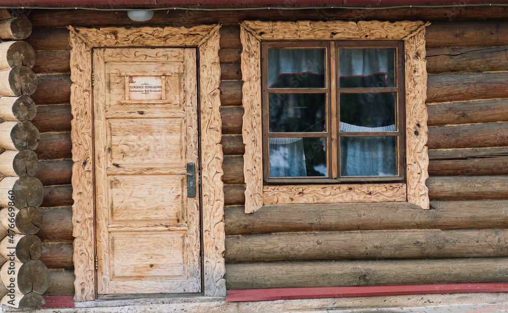 Beautiful new wooden house in the garden with decoration Beautiful new wooden house in the garden with decoration