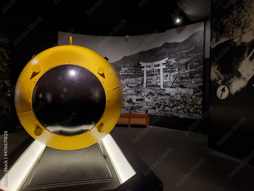 Naklejka premium A yellow bomb casing, the Fat Man, that's similar to the atomic bomb dropped on Nagasaki, Japan, during World War II. On display at the National Museum of the Pacific War in Fredericksburg, Texas.