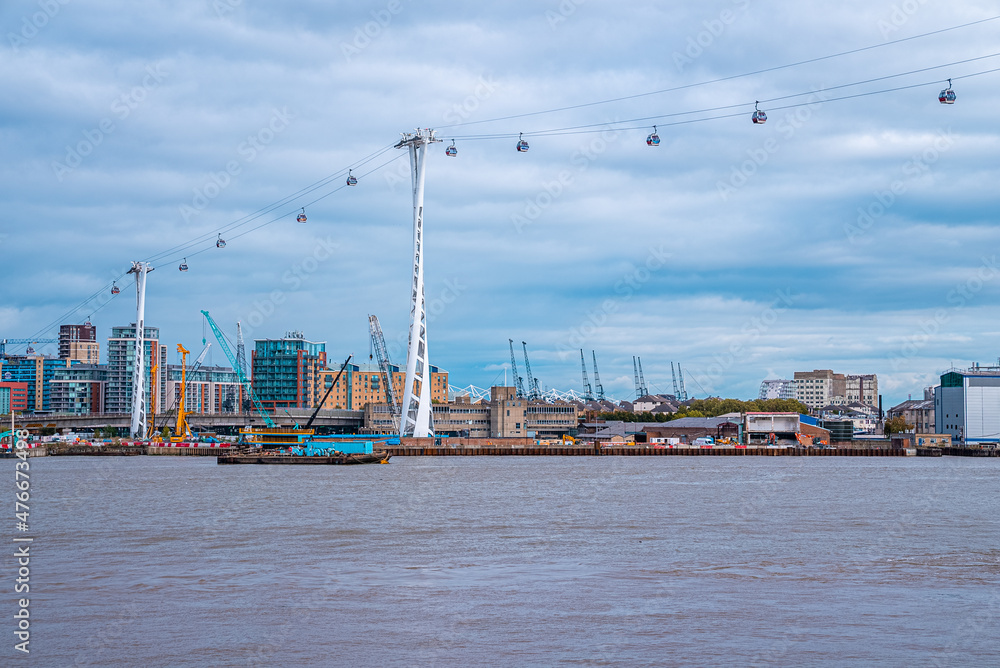 Thames cable car operated by Emirates Air Line in London. Crossing over river Thames.