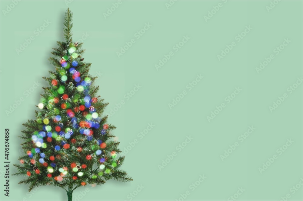 Elegant Christmas spruce, fir tree with warm sparkling garland lights. Christmas, New Year holidays celebration Elegant Christmas spruce, fir tree with warm sparkling garland lights. Christmas, New Year holidays celebration