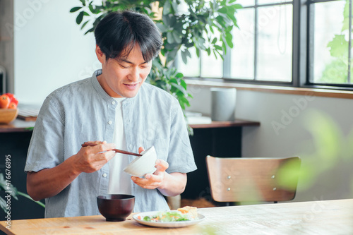 Fotografía 食事をする男性