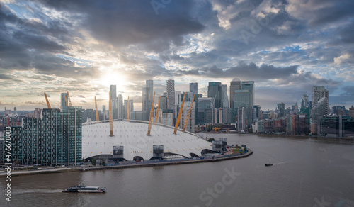 View from the river Thames over Millennium dome or O2 Arena in London, UK.  photo