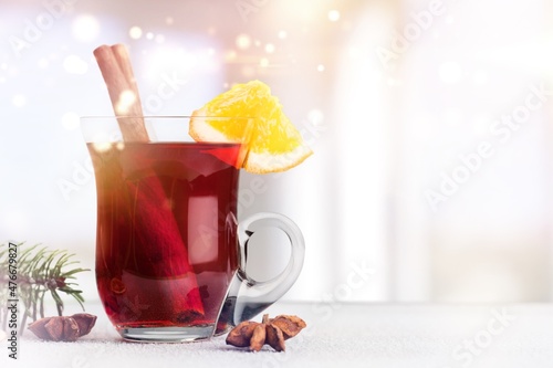 This is Christmas alcohol drink with lemon and cinnamon garnish
