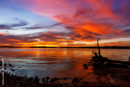 Slika na platnu Red sunset at Thunderbird lake in Oklahoma.