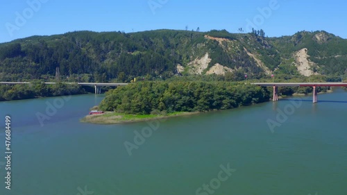 maule river bridge constitution city maule region, talca santiago de chile drone shot orbital  photo