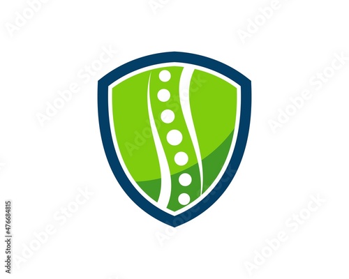 Simple shield with chiropractic symbol inside