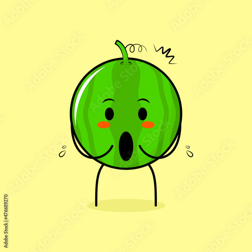 cute watermelon character with impressed expression and mouth open. green and yellow. suitable for emoticon, logo, mascot