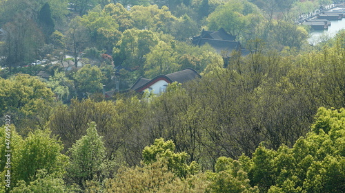 The beautiful lake landscapes in the Hangzhou city of the China in spring with fresh green mountains