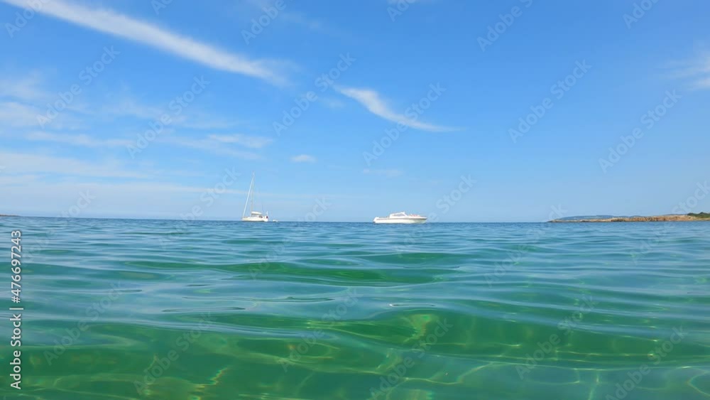 a boat and a yacht in green water a boat and a yacht in green water