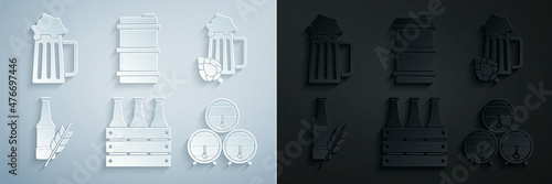 Set Pack of beer bottles, Glass and hop, Beer, Wooden barrel on rack with stopcock, Metal keg and mug icon. Vector