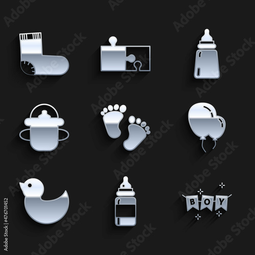 Set Baby footprints, bottle, Carnival garland with flags, Balloons ribbon, Rubber duck, and socks clothes icon. Vector