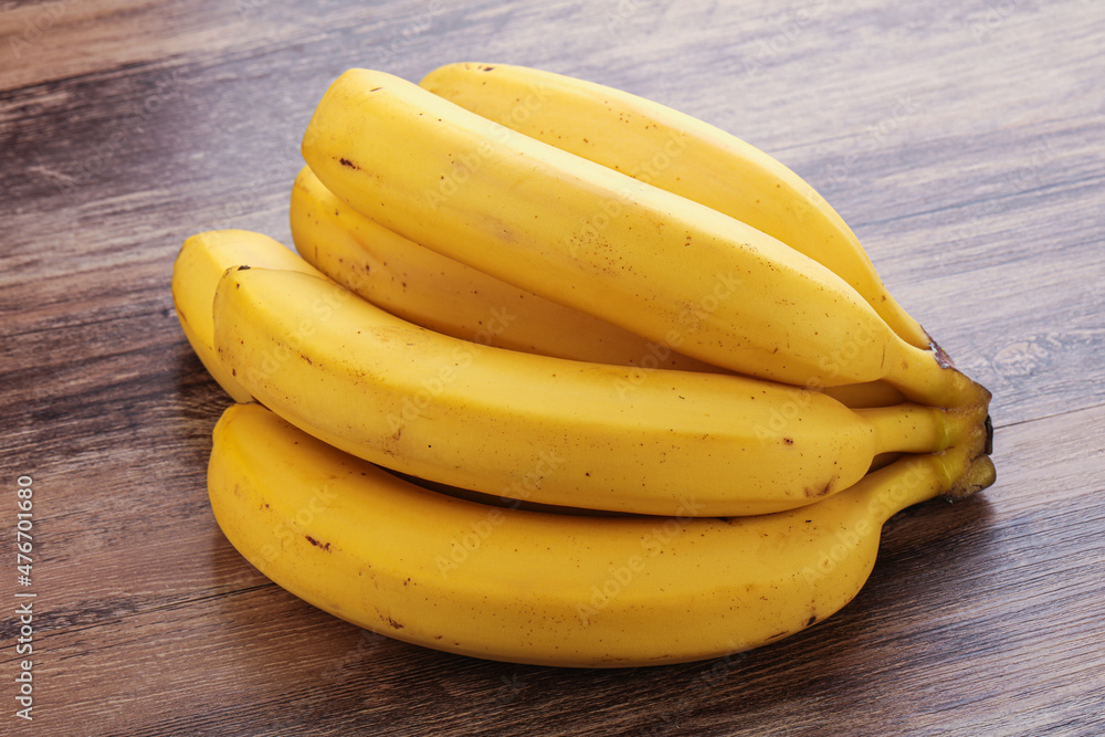 Tropical yellow banana fruit heap Tropical yellow banana fruit heap