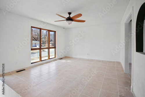 Main floor room with walkout to patio photo