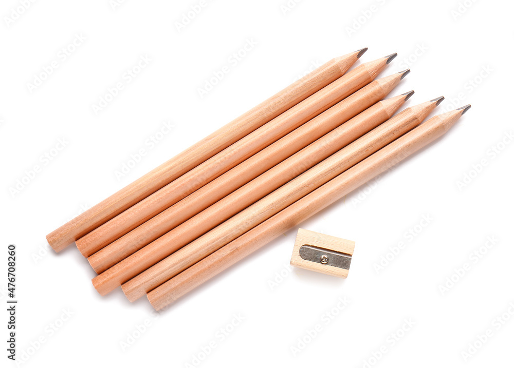 Ordinary pencils and sharpener isolated on white Ordinary pencils and sharpener isolated on white