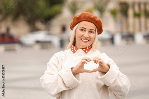 Elegant mature woman in ber...