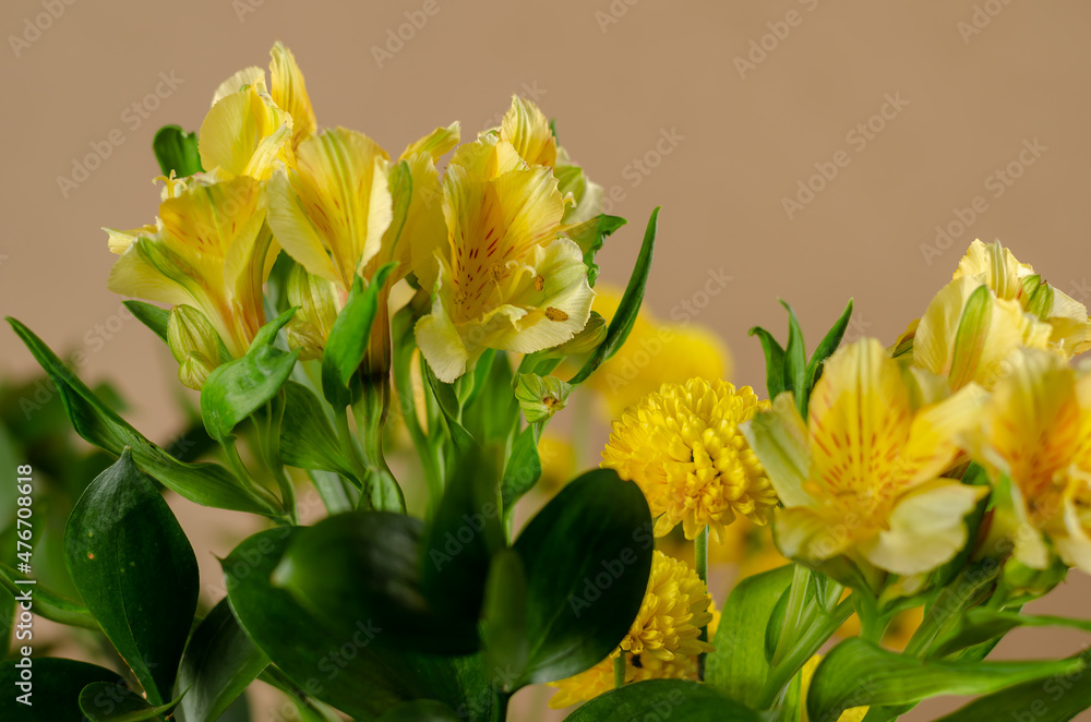 Beautiful yellow and green Bouquet of lilies and chrysanthemums