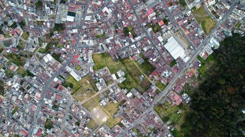 Drone Aerial Top Down View Of Urban Colonial Neighborhood Buildings And Streets In Quetzaltenango Xela Guatemala. photo