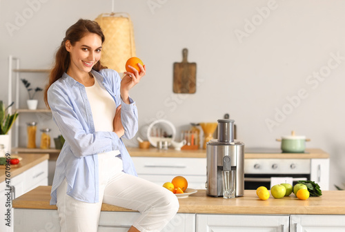 Young woman with fresh frui...