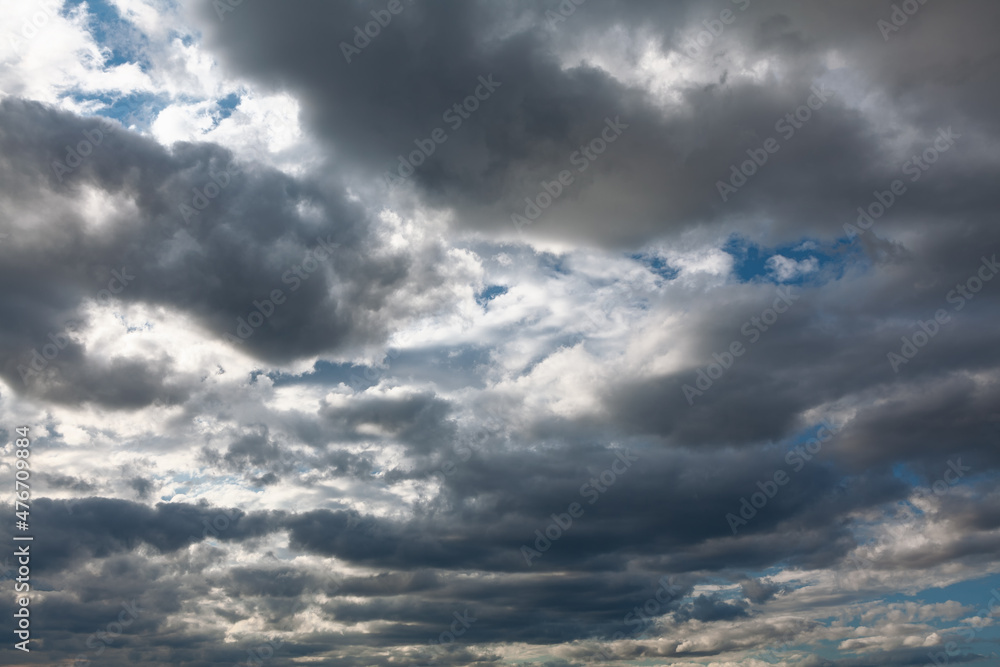 Layers of grey clouds . Cumulus before rain Layers of grey clouds . Cumulus before rain