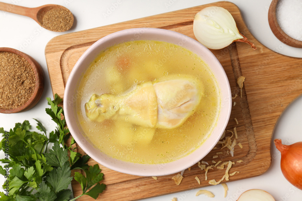 Concept of cooking chicken soup on white background Concept of cooking chicken soup on white background