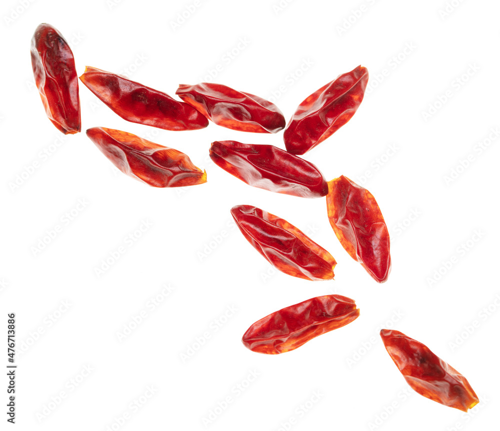 Red chili peppers on a white background. Red chili peppers on a white background.