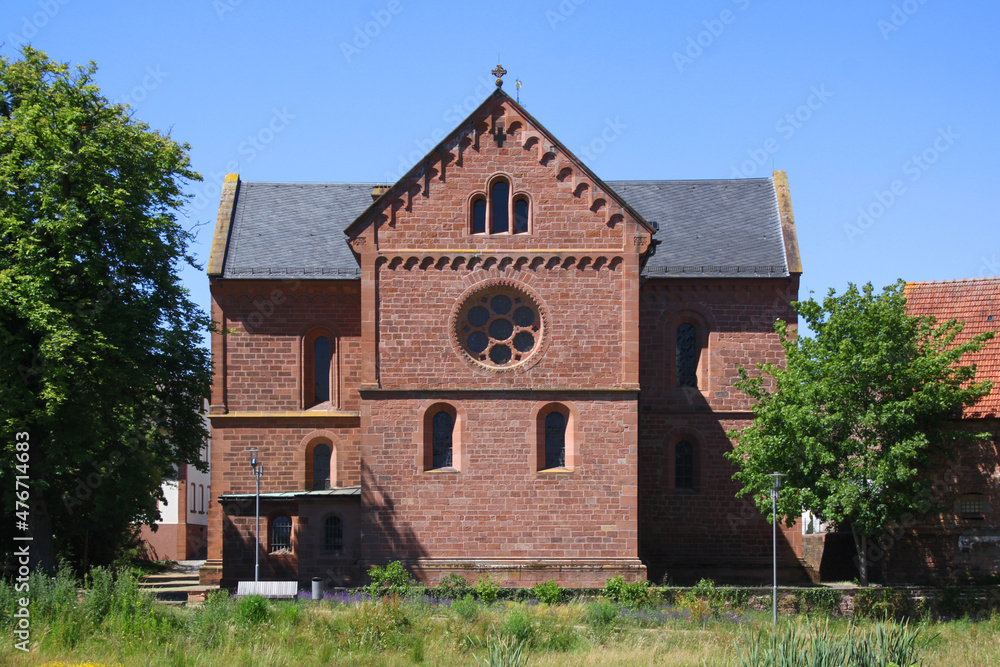 Transept and choir gable with rose window at the romanesque monastery church in the village of Enkenbach near Kaiserslautern, Pfalz region in Germany
