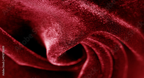Texture background, pattern. red velveteen. Rock the runway with this beautiful high fashion fabric. This medium weight fabric has a beautiful shine with a velvet face for a feeling of luxury.