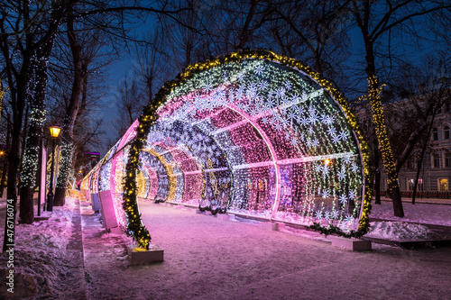 Fotografering New Year's decoration of Tverskoy Boulevard, a bright multicolored glowing tunnel