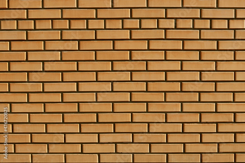 A wall of yellow bricks. Texture to overlay. Backgrounds