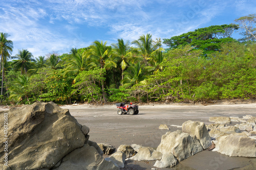 Quad bike on a rocky beach of Costa Rica photo