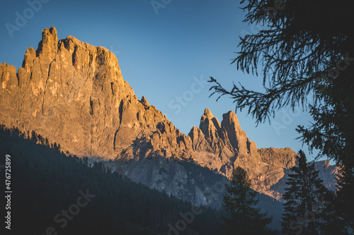 sunset over the dolomites mountains of pale di san martino