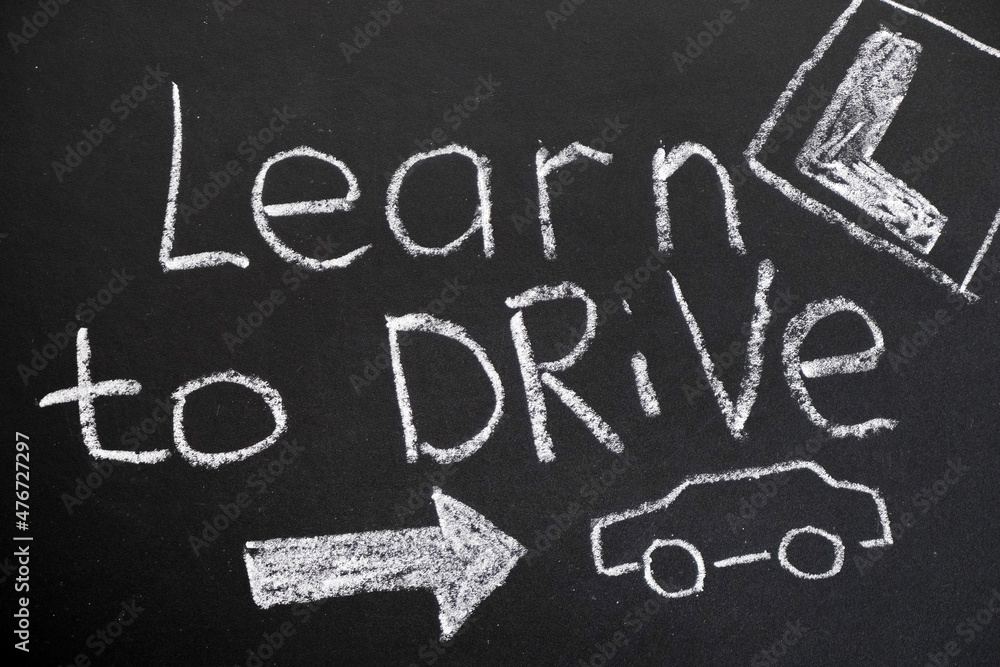 Driving school chalkboard, Educational and Creative composition with the Learn to drive caption. Driving school chalkboard, Educational and Creative composition with the Learn to drive caption.