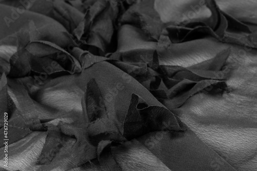 Texture. Background. Background. Black gray satin dark fabric texture luxurious shiny that is abstract silk cloth background.