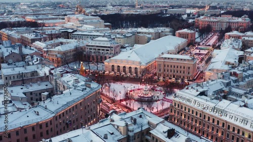 St. Petersburg, Russia, winter 2021: aerial view City center new year illumination, snow covered winter city and fair