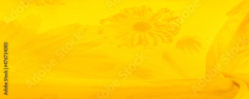 Background texture, yellow silk fabric with painted meadow flowers, colors between green and orange in the spectrum, the main subtractive color, painted like ripe lemons or egg yolks. photo