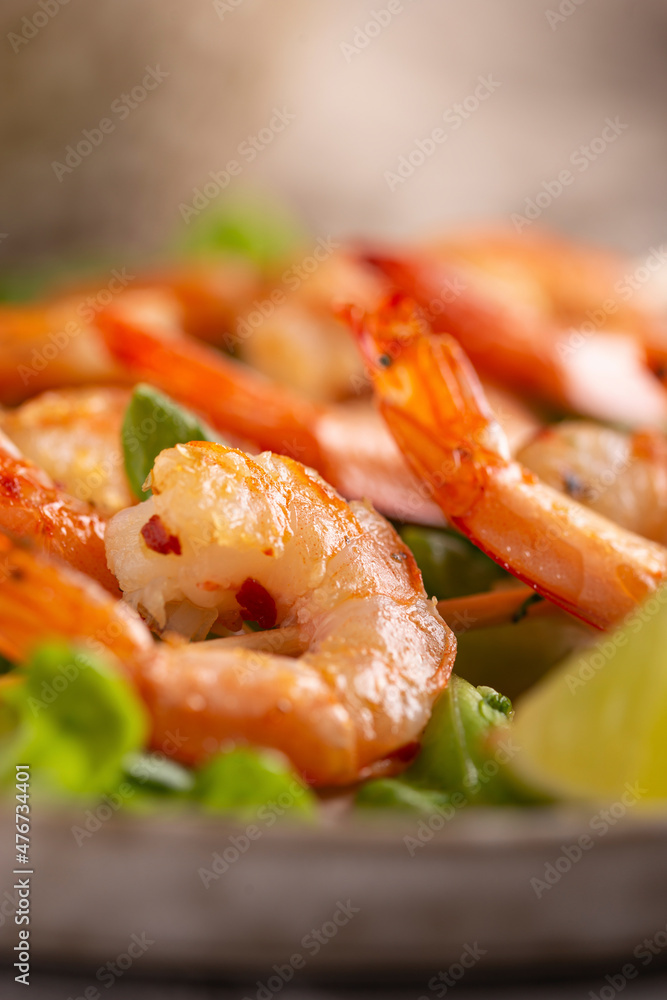 Grille shrimps with salad on a plate Grille shrimps with salad on a plate