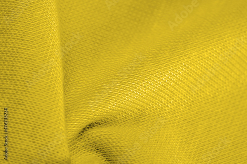 Background, texture, pattern, yellow wool, thin soft curly or wavy hair forming the hair of a sheep, goat or similar animal, especially when used in the manufacture of fabric or yarn.