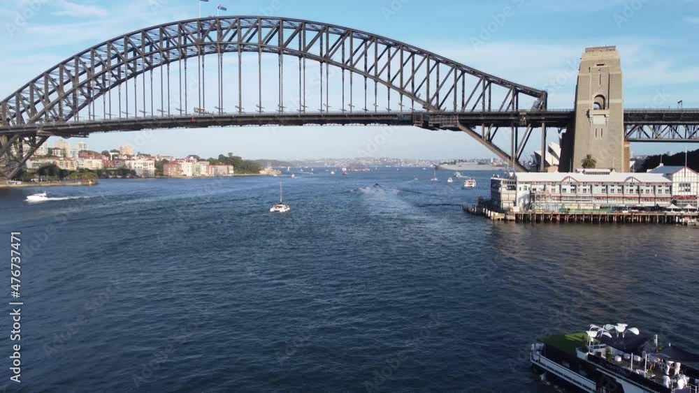 Drone aerial shot of ferry party boat in Sydney Harbour channel with Bridge Walsh Bay Port Jackson City tourism landmark NSW Australia 4K Drone aerial shot of ferry party boat in Sydney Harbour channel with Bridge Walsh Bay Port Jackson City tourism landmark NSW Australia 4K