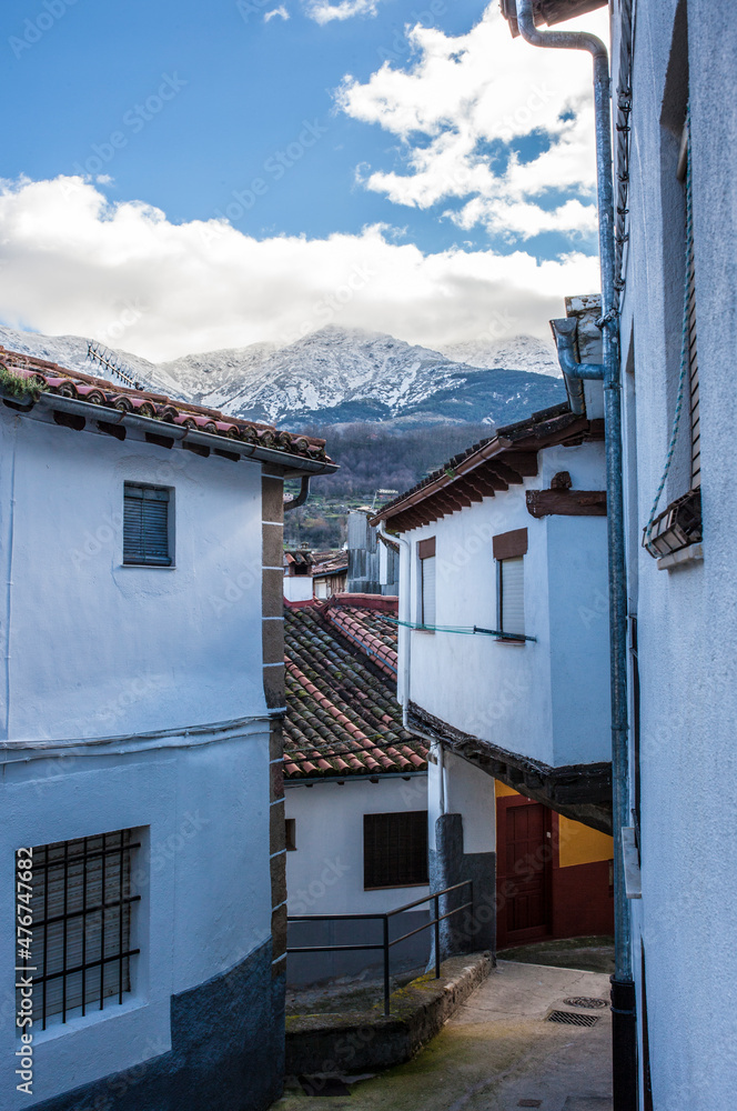 Jewish Quarter of Hervas with snowy mountains at bottom