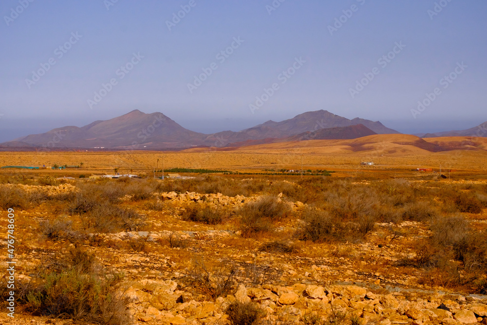 Landscape view with red volcanic earth in the center of the Canary Island of Fuerteventura, Spain.