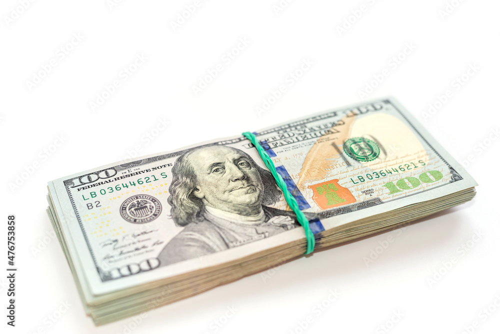 Bundle of dollars isolated on white background with copy space. Financial concept. Bundle of dollars isolated on white background with copy space. Financial concept.