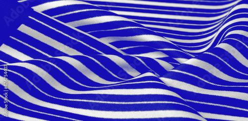 silk striped fabric. blue white stripes. This beautiful, super soft, medium-sized silk blend is perfect for your design projects. It is brushed on the back for a luxurious feeling.