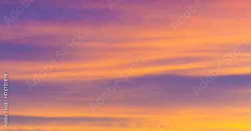 Beautiful morning sky.    Orange red blue paints. Heavenly abstract summer gentle background. Beautiful picturesque bright majestic dramatic evening morning sky at sunset or dawn. © Татьяна Мищенко