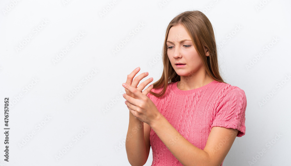 Young Russian woman isolated on white background suffering from pain in hands Young Russian woman isolated on white background suffering from pain in hands