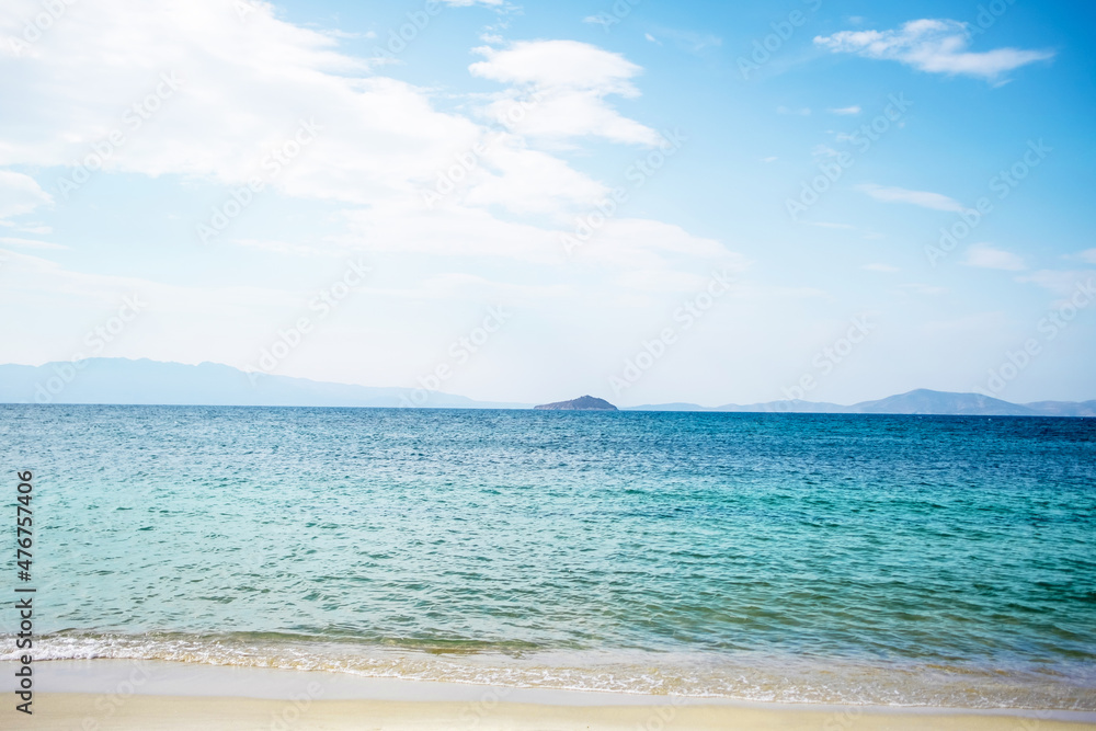 Beautiful beach with white sand, turquoise sea, blue sky with clouds and islands on a Sunny day. Turkey, perfect sea landscape. Beautiful beach with white sand, turquoise sea, blue sky with clouds and islands on a Sunny day. Turkey, perfect sea landscape.