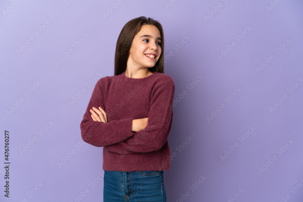 Little girl isolated on purple background with arms crossed and happy Little girl isolated on purple background with arms crossed and happy