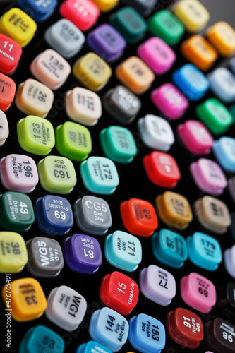 Professional markers for sketching close-ups of different colors.